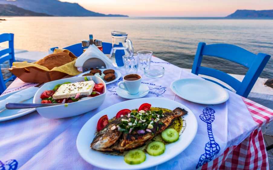 Traditional Cretan Dorada fish and Greek salad