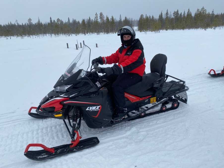 Jordan on a snowmobile safari